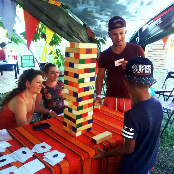 Testing the giant Jenga game with VET students at the Nevelök haza courtyard in Pécs, June 2021.